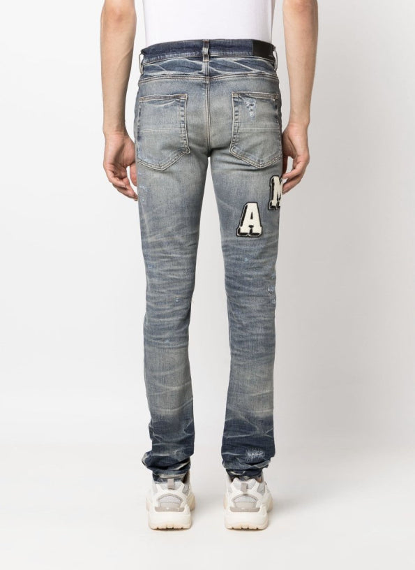 Varsity Ripped Skinny Jeans