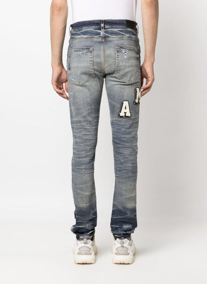 Varsity Ripped Skinny Jeans